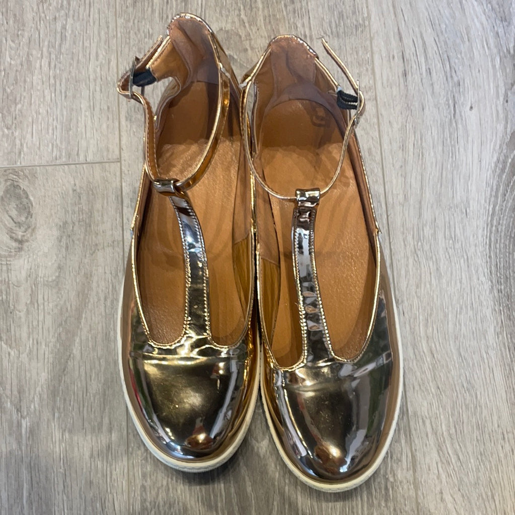 Rose gold flats size 9